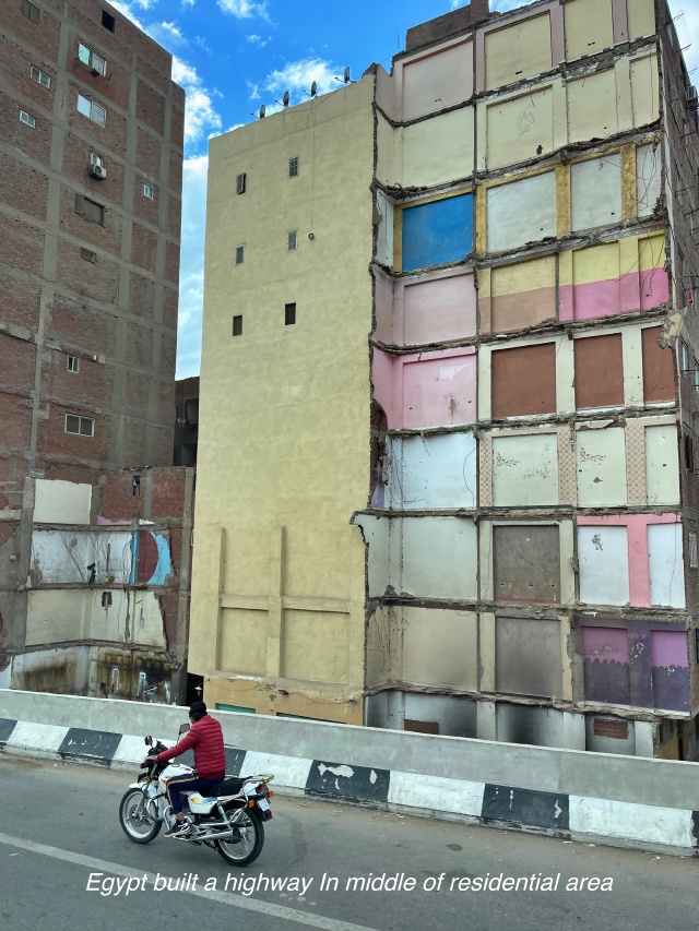 2023/2023-Holy-Land-Adventure/Day-1-Cairo-to-Mount-Sinai/640x480_2023-04-11 00-10 Highway Middle Of A Residential Area Egypt.jpg